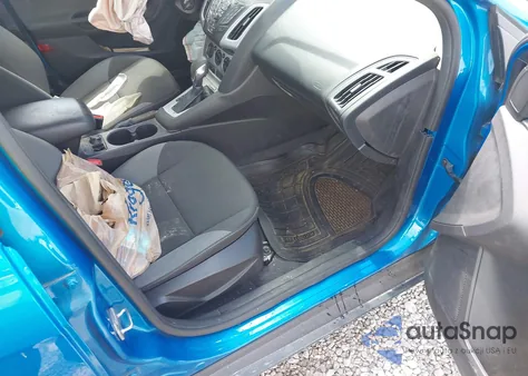 2014 Ford Focus Se z USA, uszkodzony, nr VIN 1FADP3F21EL320690